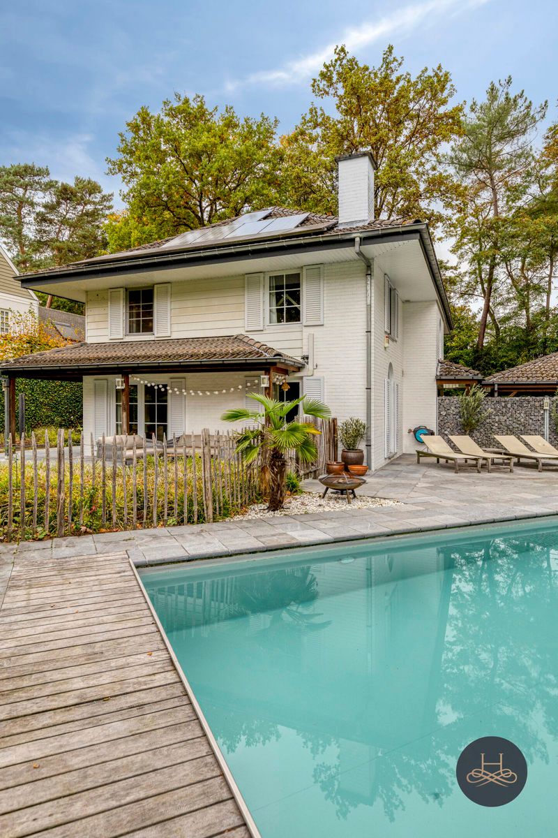 Indrukwekkende groen gelegen villa met zwembad en poolhouse  foto 43