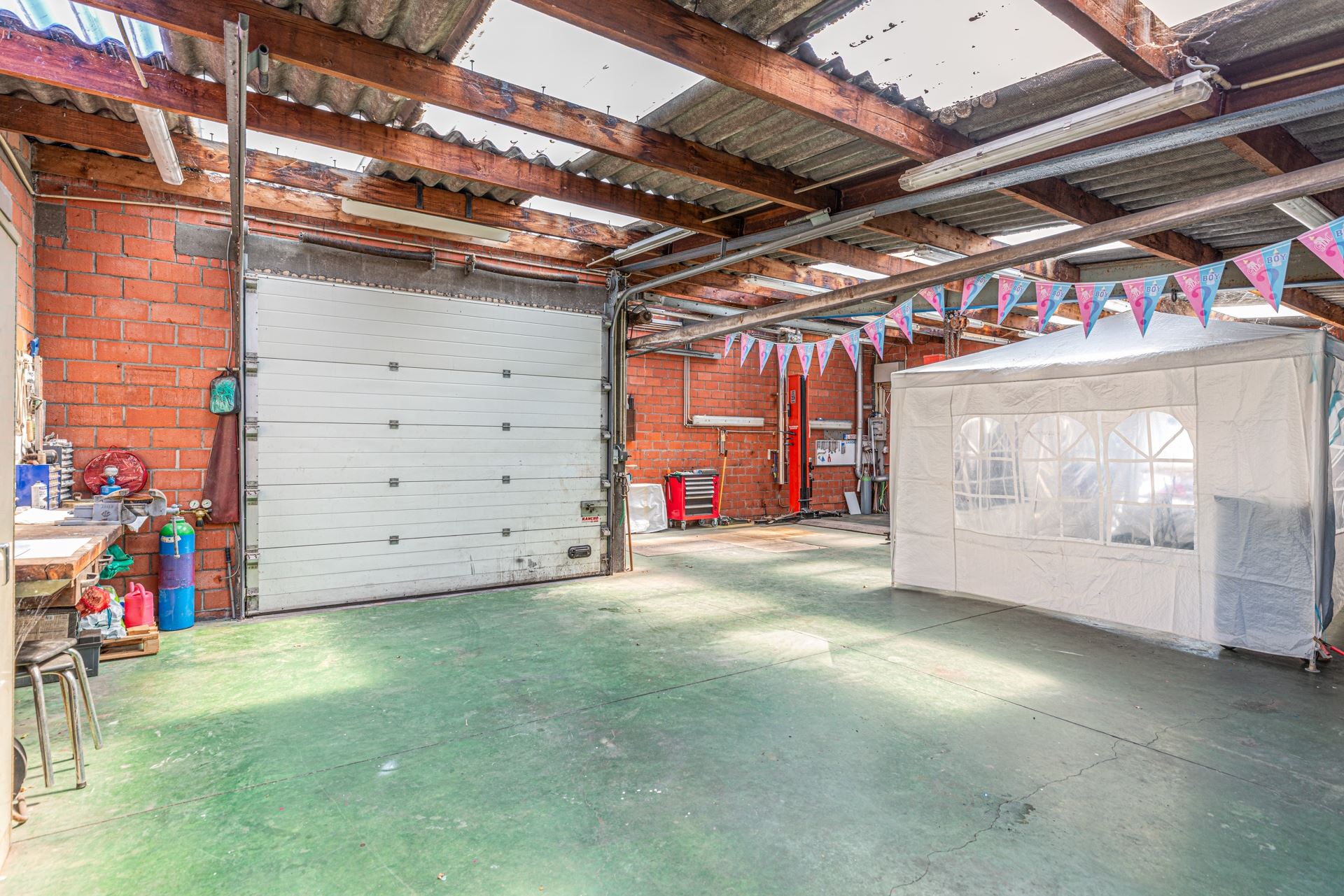 Unieke eigendom te koop met twee woningen en loods te Zingem foto 22