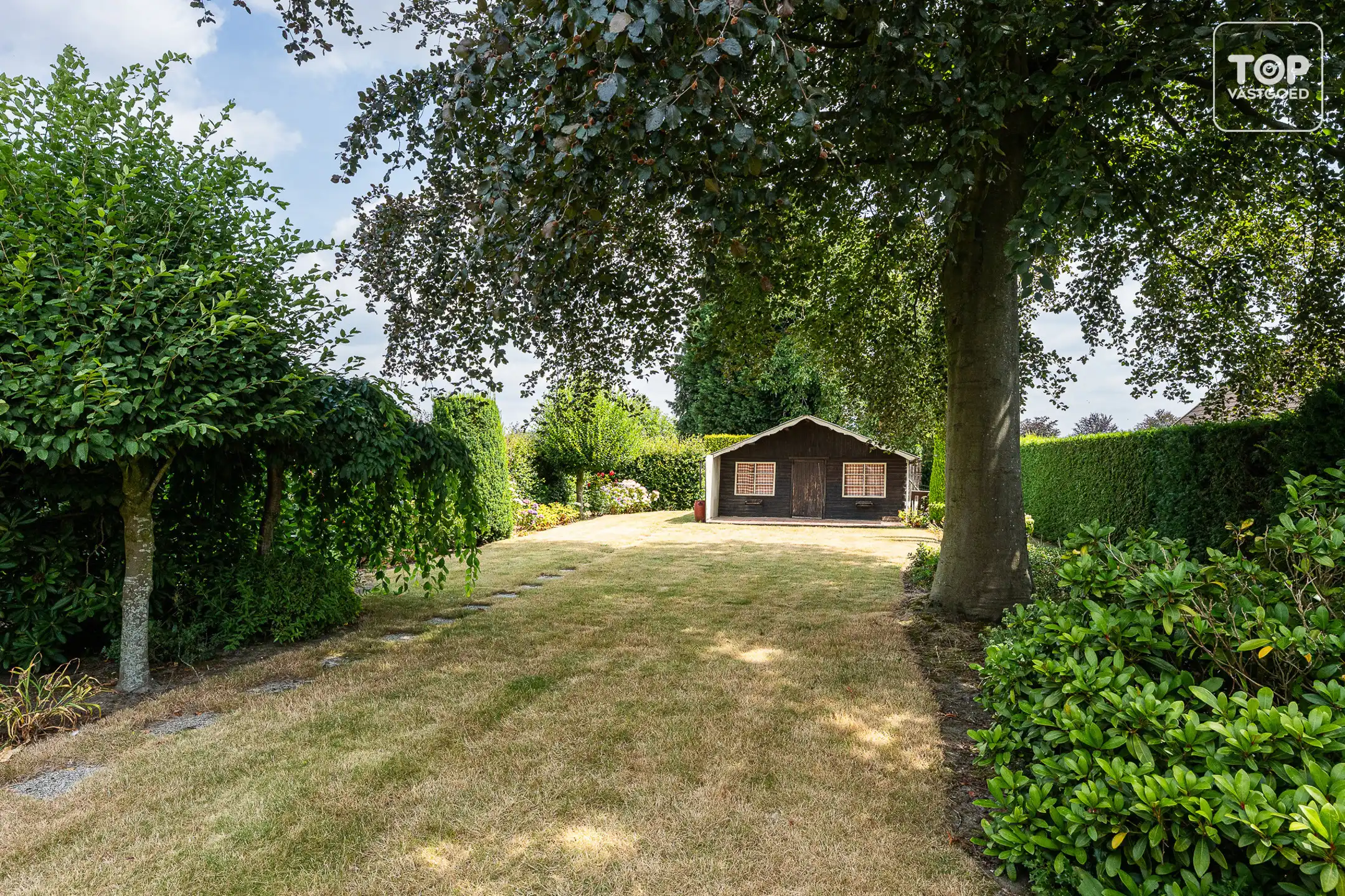 Rustig gelegen woning met ruime tuin, bos en prachtig open uitzicht foto 27