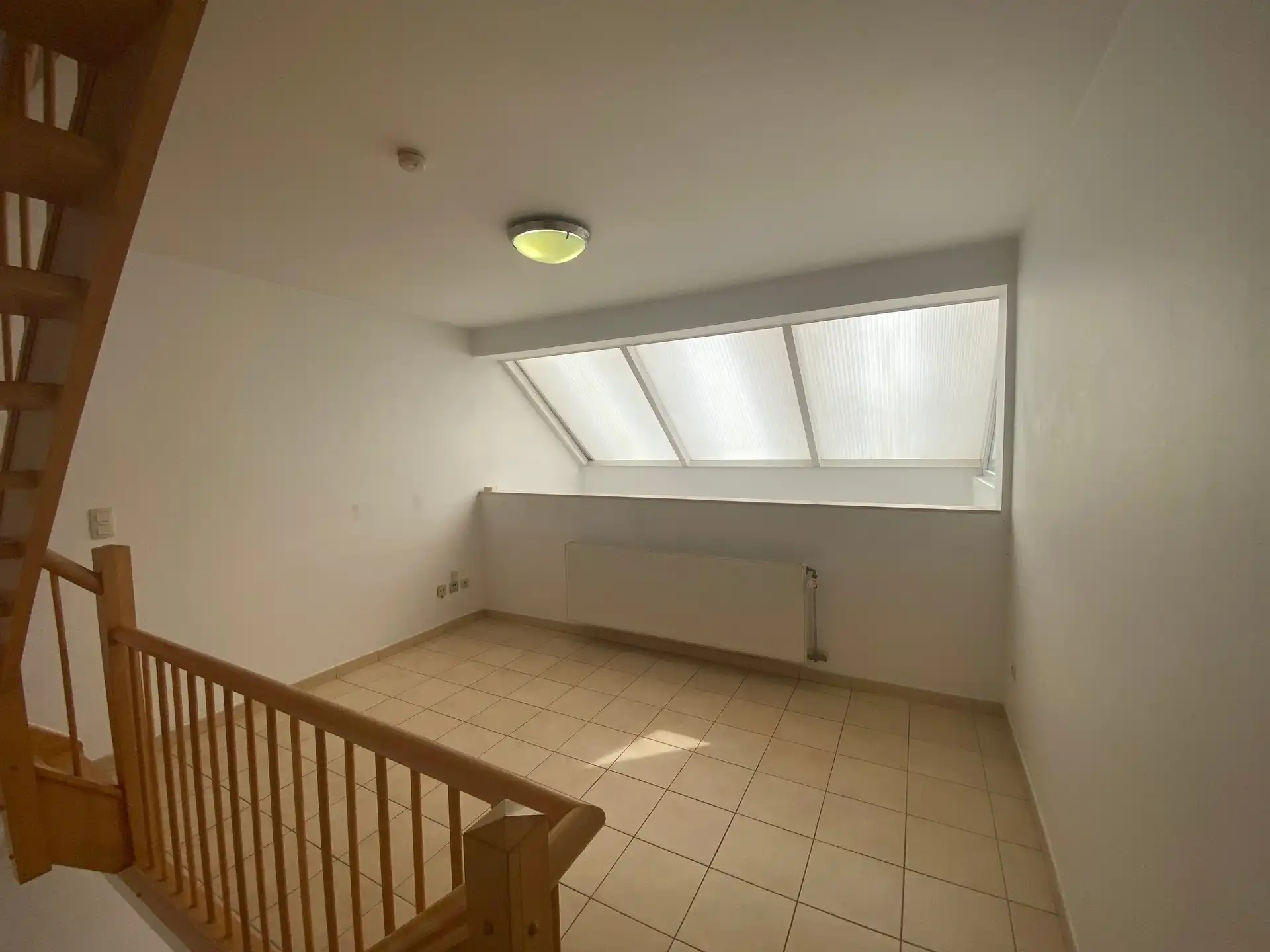 Ruime en lichtrijke woning met aangename west-geörienteerde tuin, gelegen in een rustige en doodlopende straat op wandelafstand van het centrum van Kortenberg. foto 11