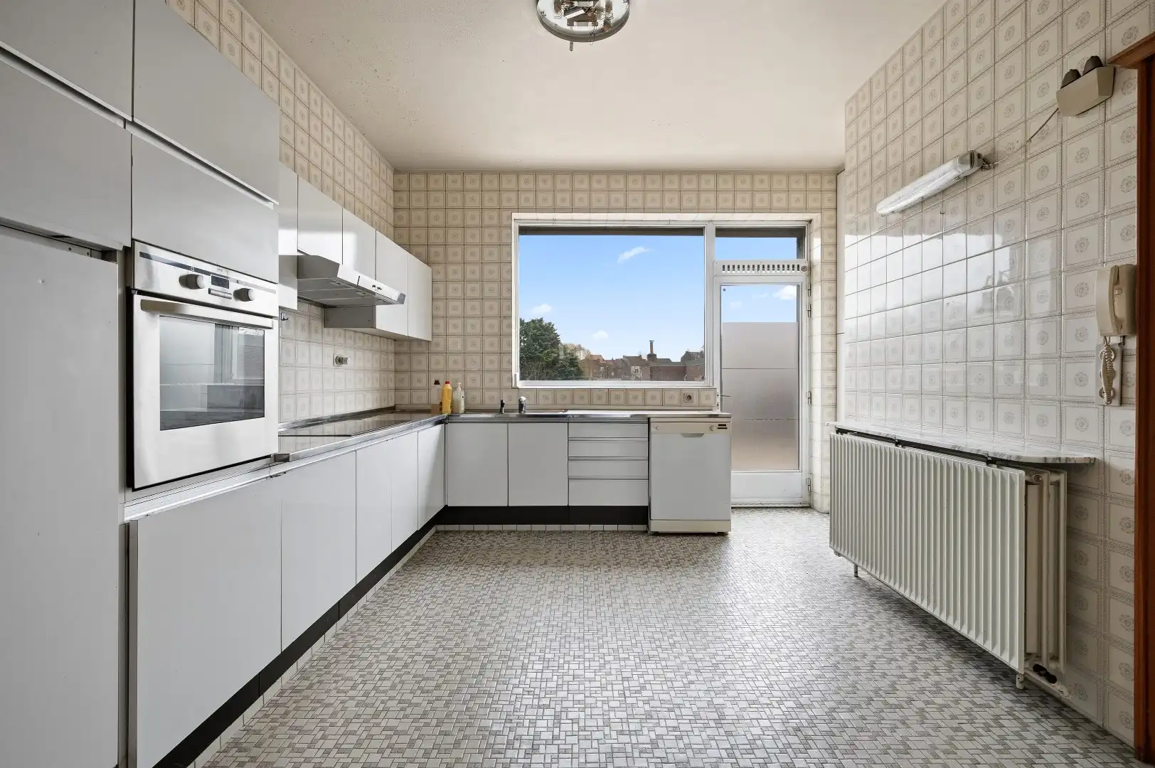 Te renoveren bel-étagewoning op topligging in het centrum van Tienen foto 10