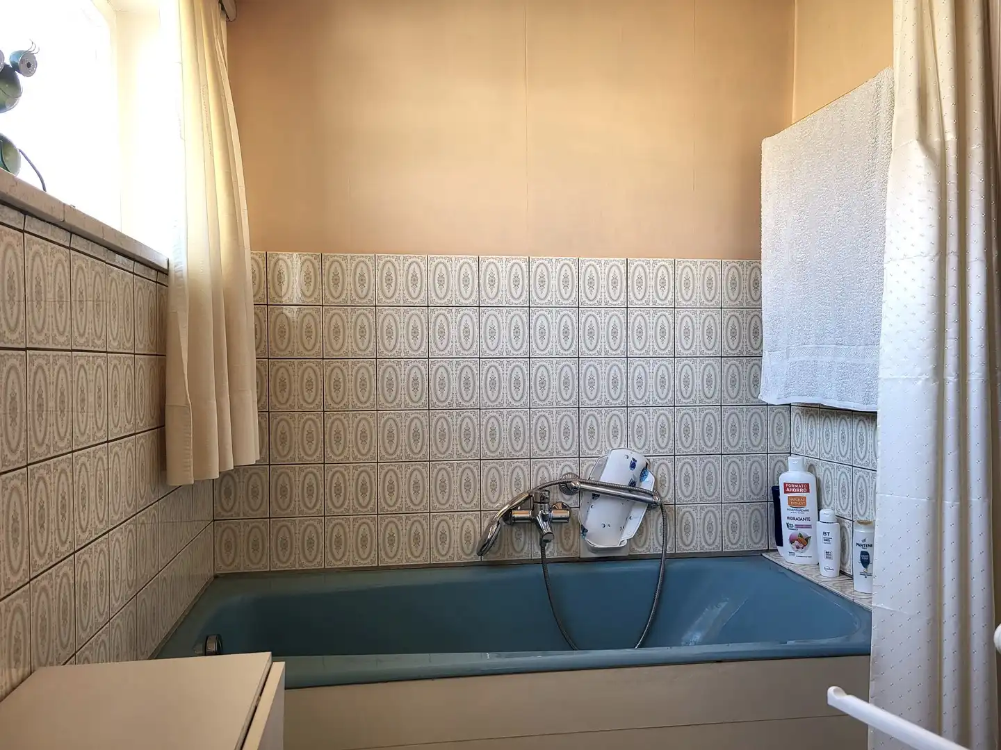 Deze ruime halfopen bebouwing met een bewoonbare oppervlakte van 134 m² is rustig gelegen aan de stadsrand. foto 22