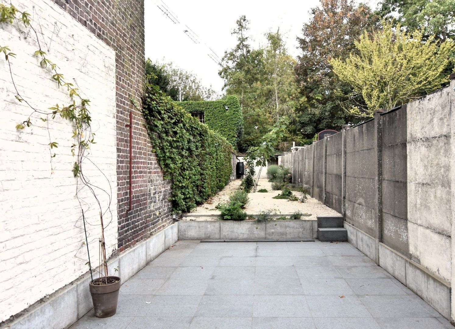 Toffe stadswoning met tuin in RSL foto 26