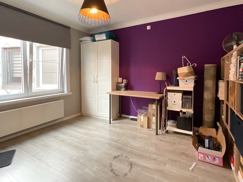Ruim appartement van 130m² met twee slaapkamers, terras en autostaanplaats foto 13