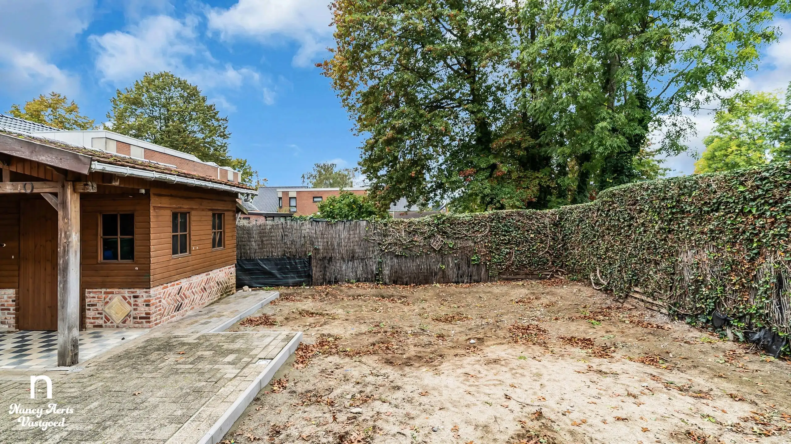 Halfopen gezinswoning met 3 slaapkamers en zonnige tuin foto 24