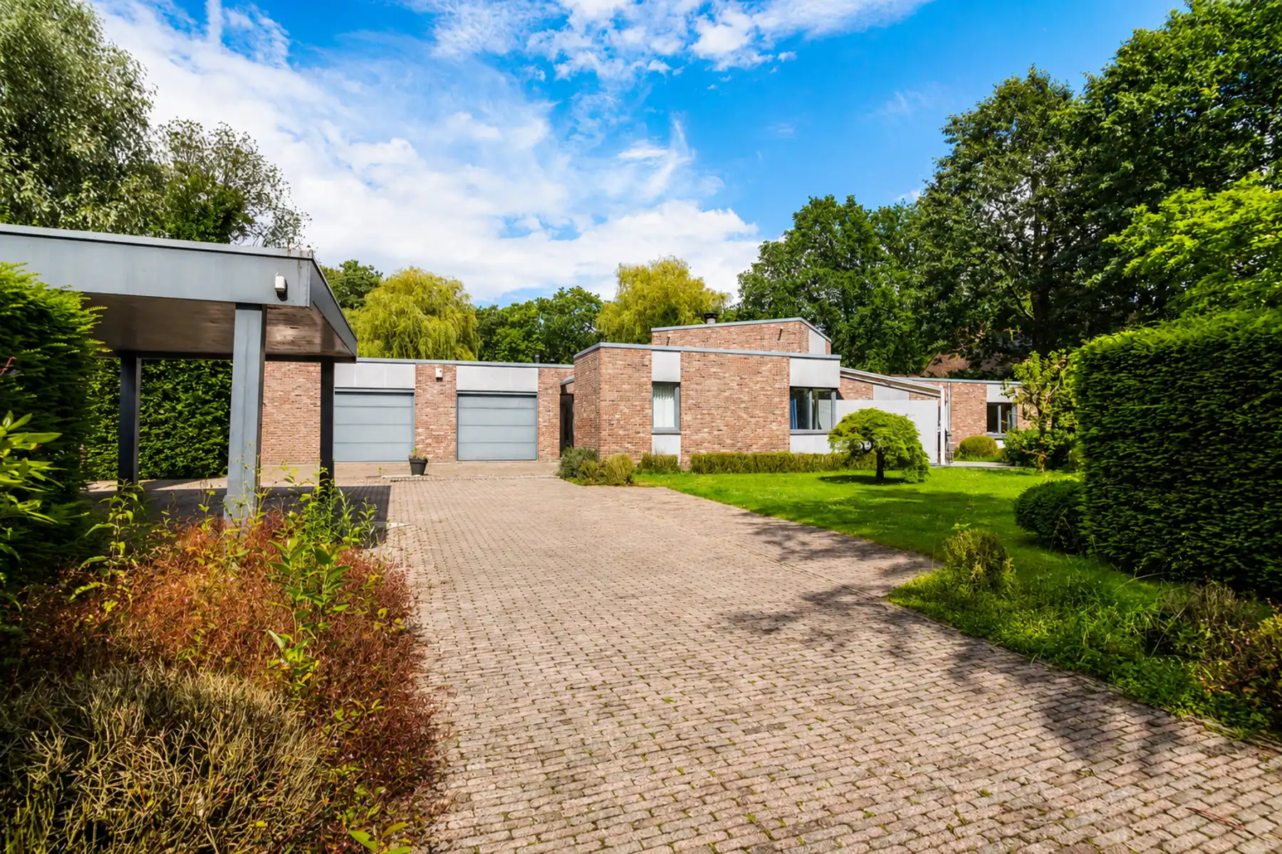 Exclusieve architectenwoning met zwembad in Kapellenbos foto 5
