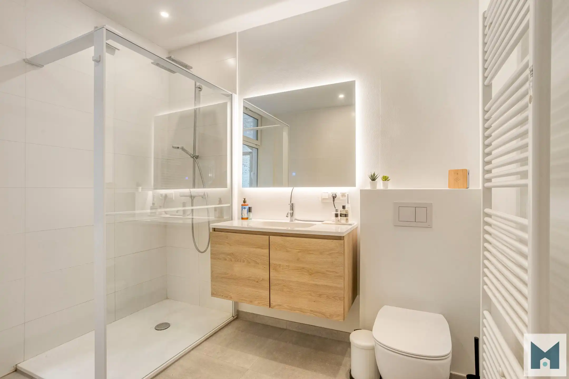 Ruim gelijkvloers appartement met 2 slpks en stadskoer! foto 11