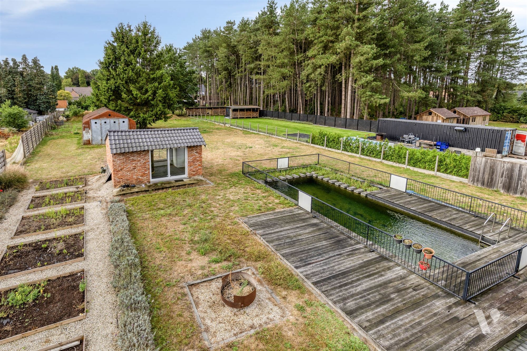 Prachtig gerenoveerde woning (279m²) met zwemvijver foto 39