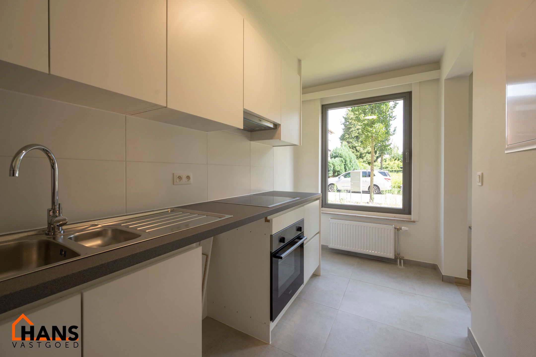 Gerenoveerd gelijkvloersappartement; mogelijk garage bij te huren. foto 6