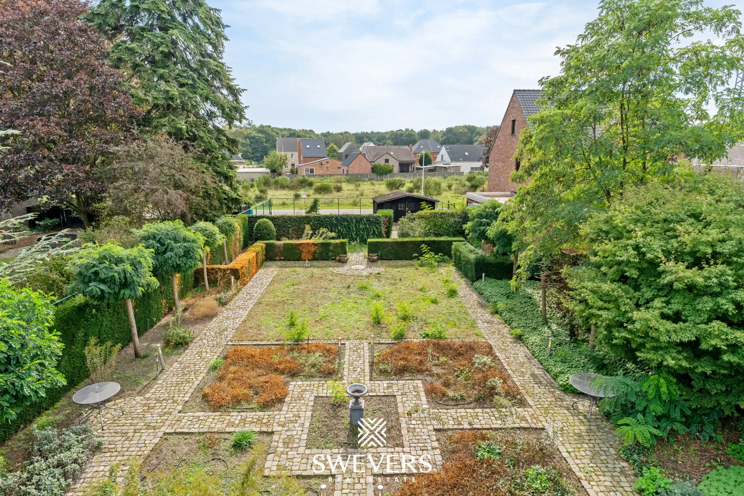 Knappe woning met orangerie, mogelijkheid tot 4 slpk en achterliggende bouwgrond foto 32