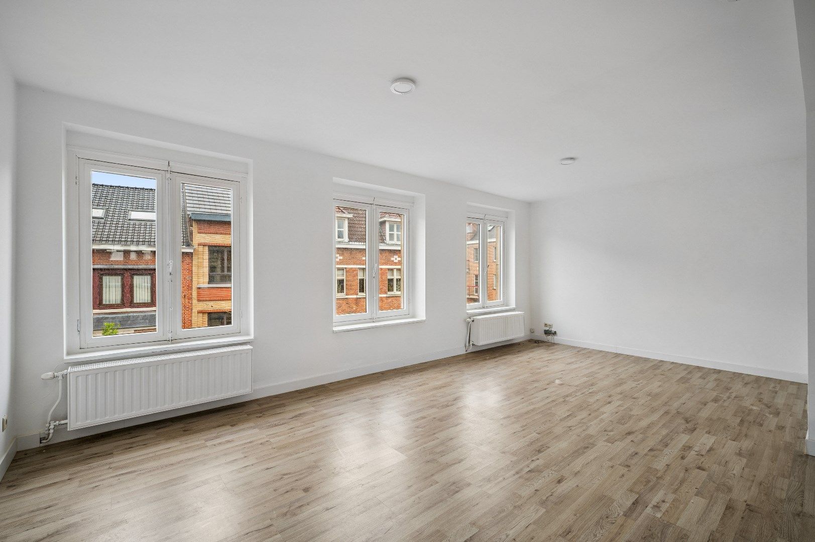 Opbrengsteigendom met 2 appartementen en een handelspand in het hart van Tienen foto 22