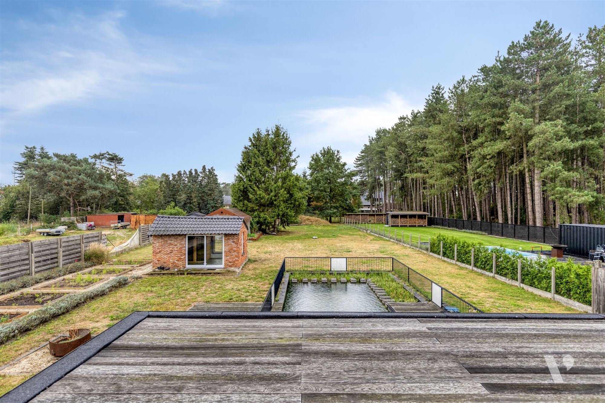 Prachtig gerenoveerde woning (279m²) met zwemvijver foto 22