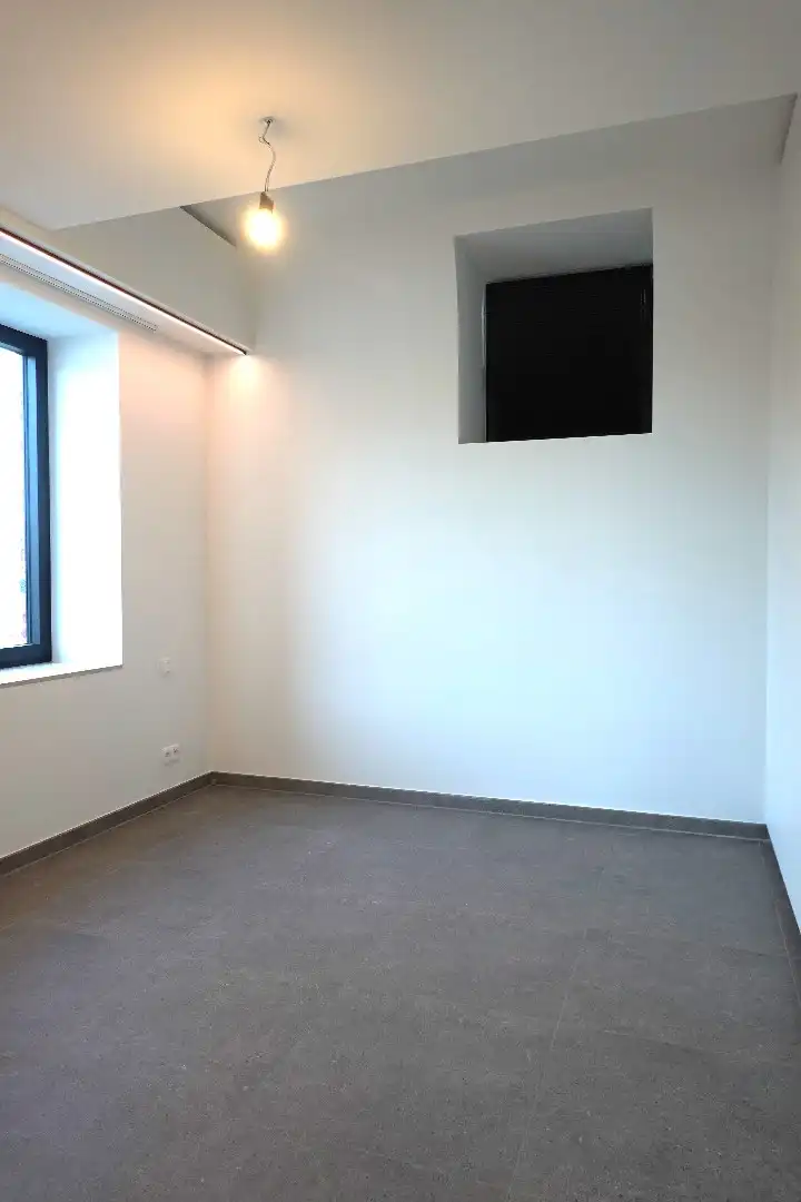 Prachtig 3-slaapkamerappartement met staanplaats in het voormalige gemeentehuis van Vleteren foto 9