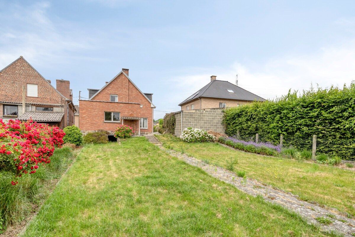 Ruime woning met tuin en 6 slaapkamers foto 4