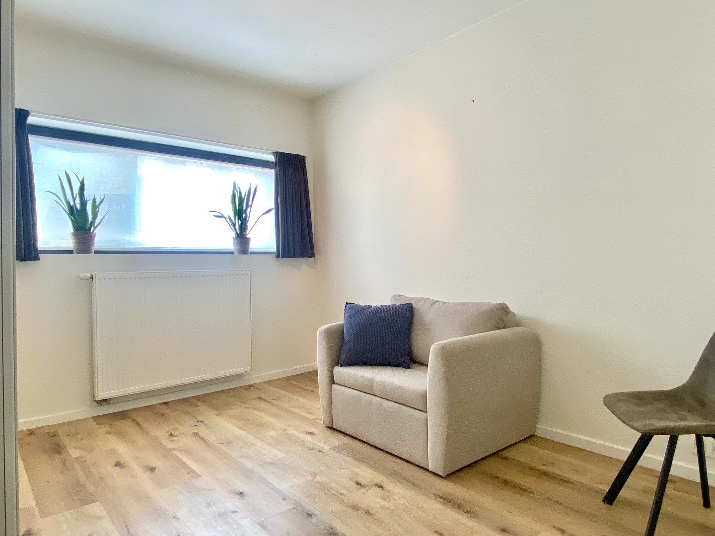 Gelijkvloers appartement met tuin, staanplaats en 133m² bew opp. foto 9