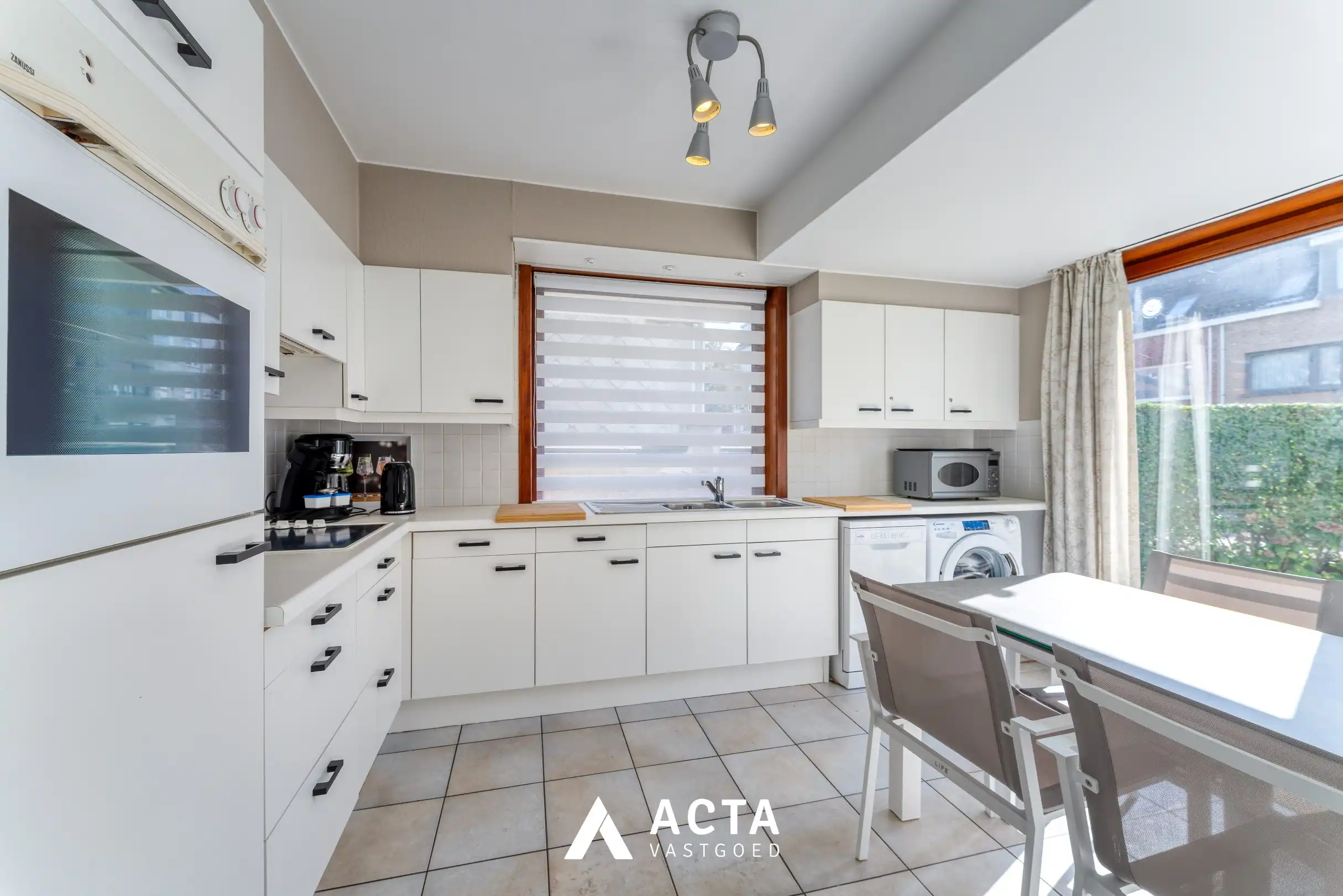 Gelijkvloers 3-slpk-appartement+tuin in Mariakerke foto 7