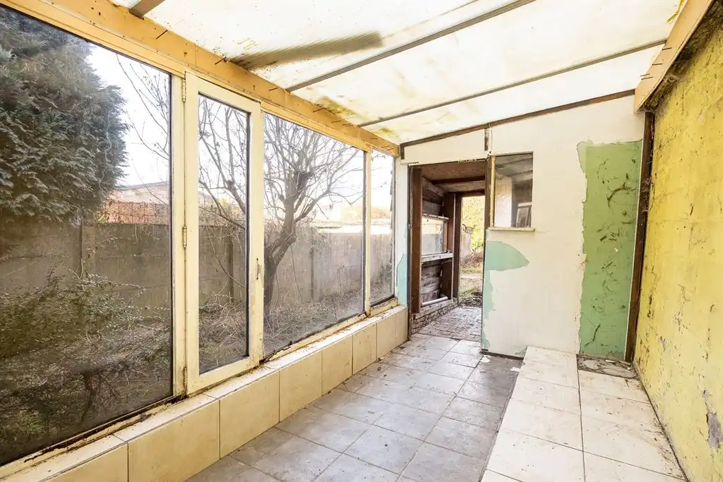 Te renoveren woning met grote tuin foto 5