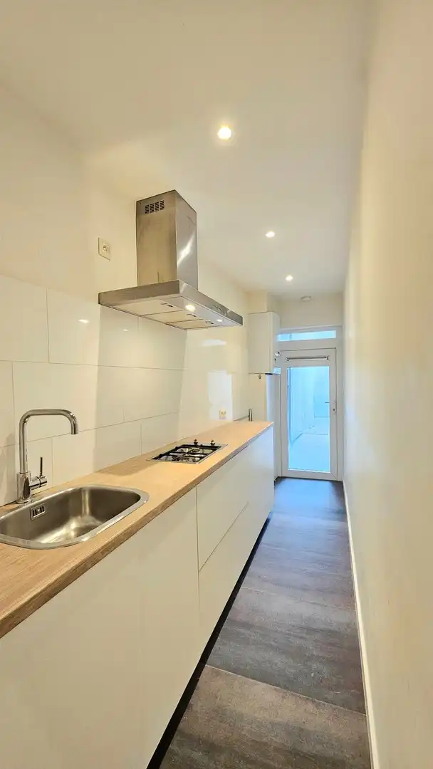 Appartement op het gelijkvloers met koer foto 7