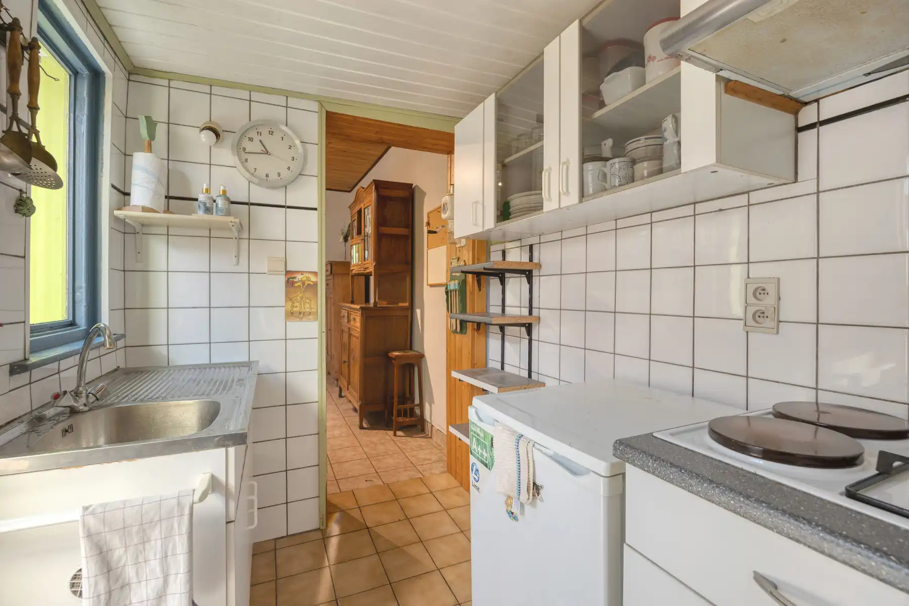 TE KOOP - gesloten bebouwing met 2 slaapkamers en tuin foto 6