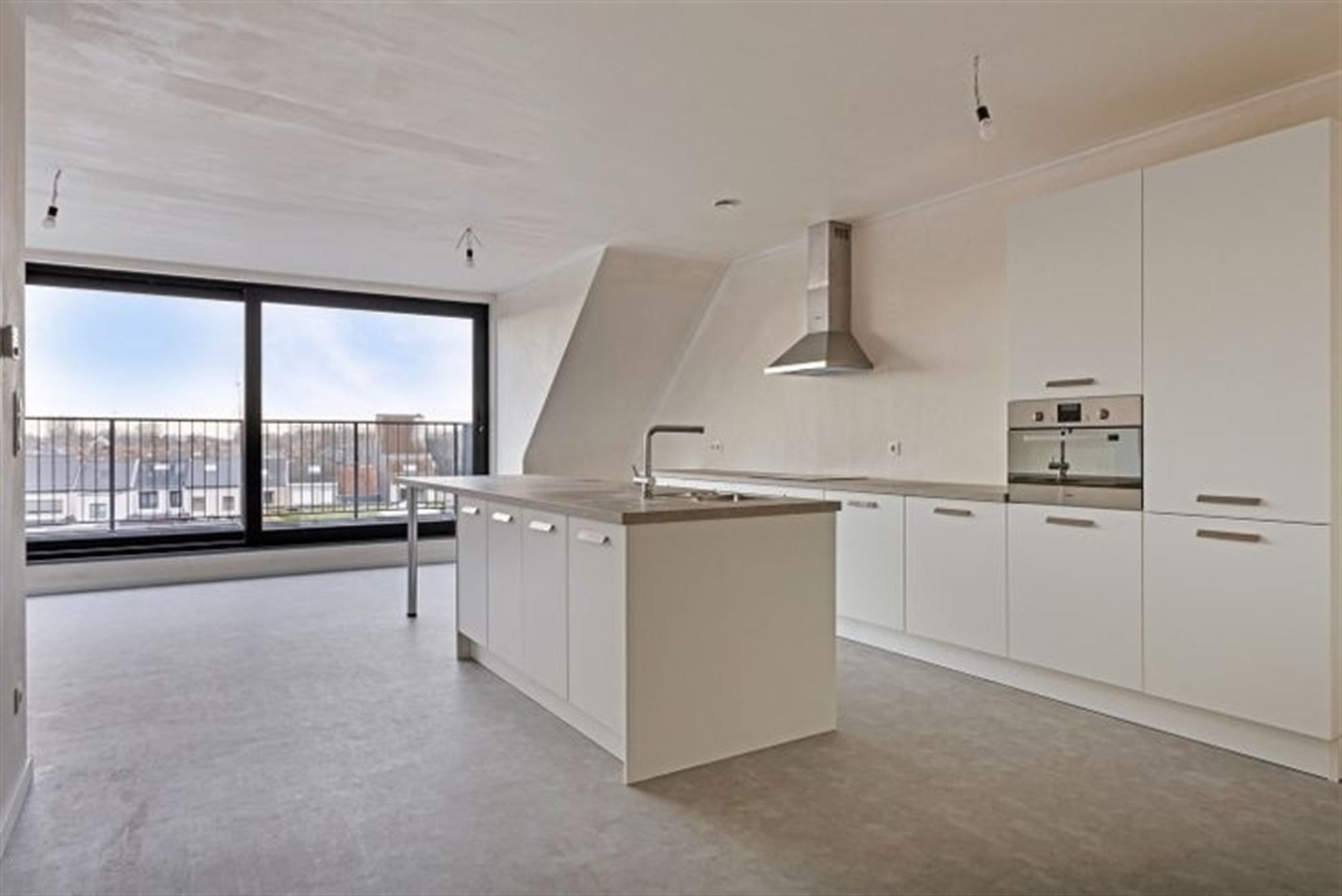Nieuwbouwappartement met 2 slaapkamers en lift in centrum foto {{pictureIndex}}