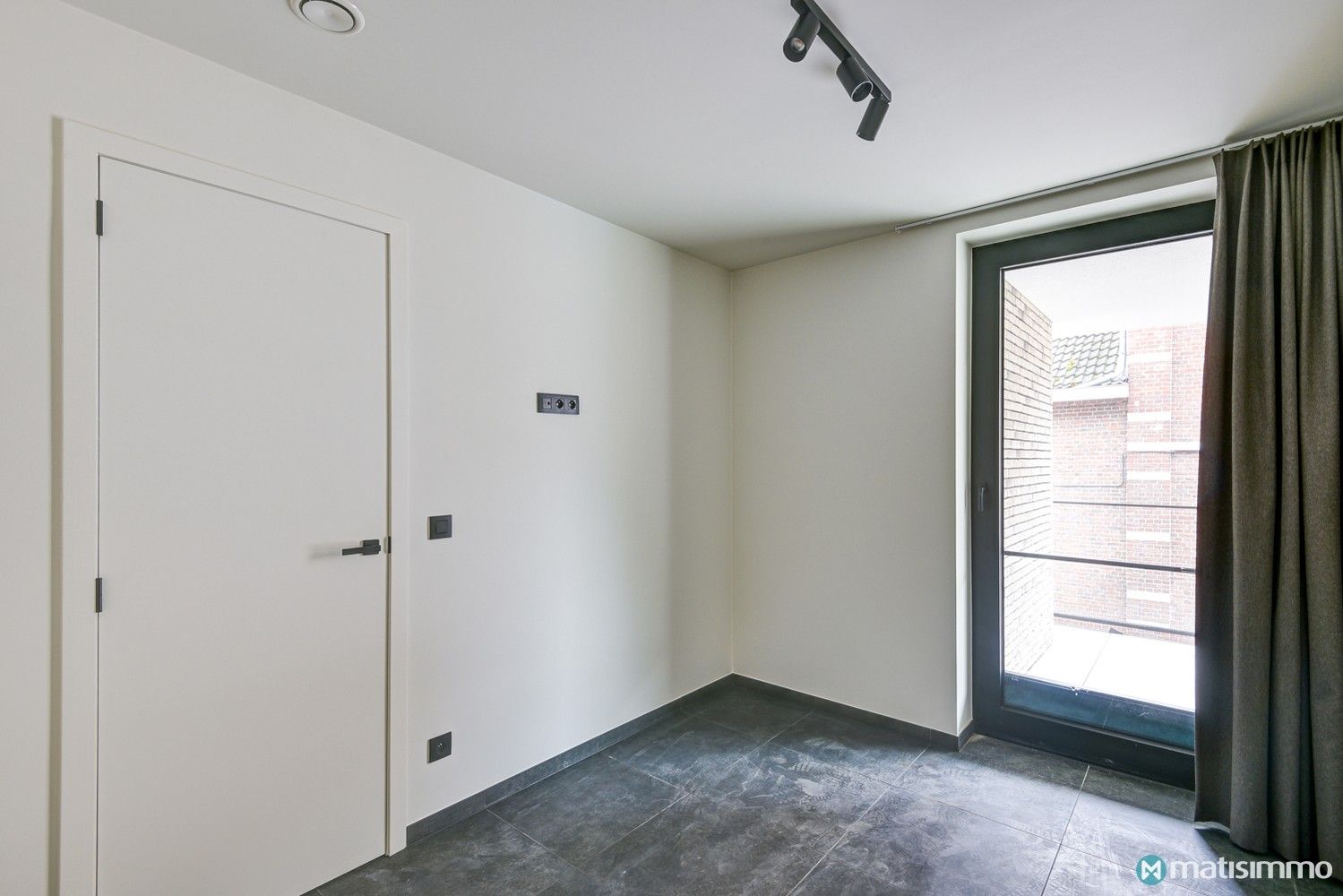 ENERGIEZUINIG APPARTEMENT MET 2 SLAAPKAMERS EN PARKEERPLAATS IN HET CENTRUM VAN BILZEN foto 8
