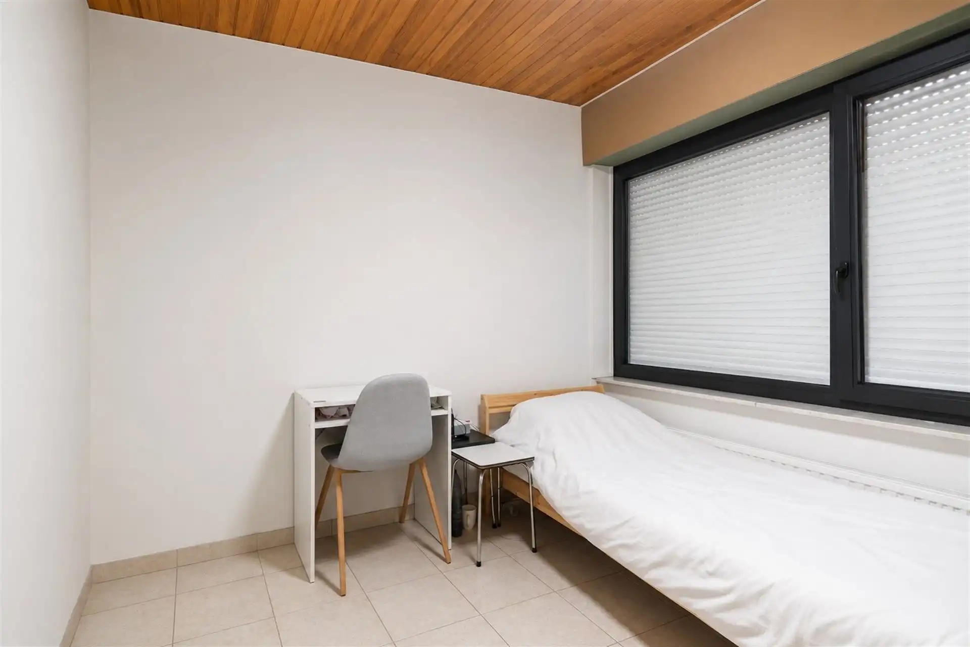 Ruim gelijkvloers appartement van 95 m² met drie slpk's! foto 4