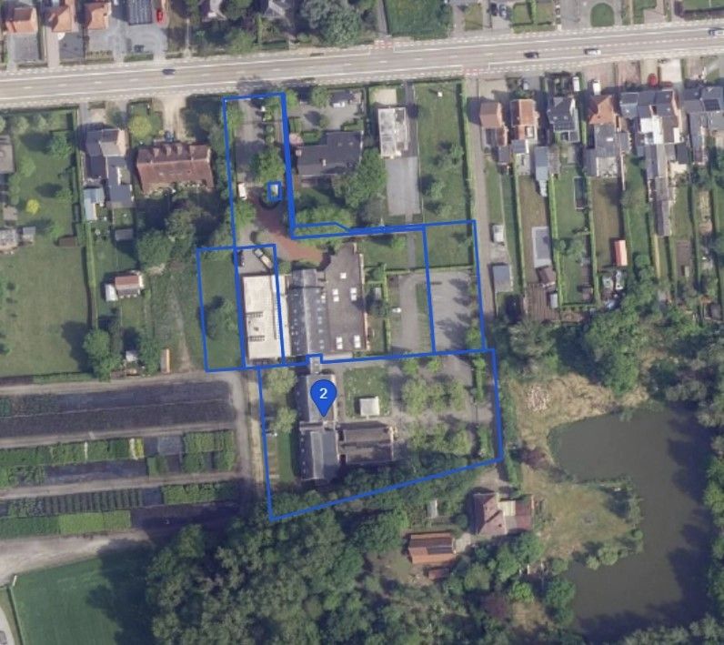 Kantoorgebouw met magazijnruimte, bruto vloeropp 2.916m² op een totaal perceel gelegen van 94a33ca. foto 6