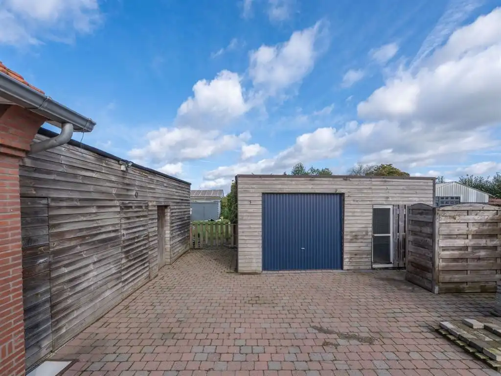 Verzorgde vrijstaande woning, grotendeels gerenoveerd foto 7