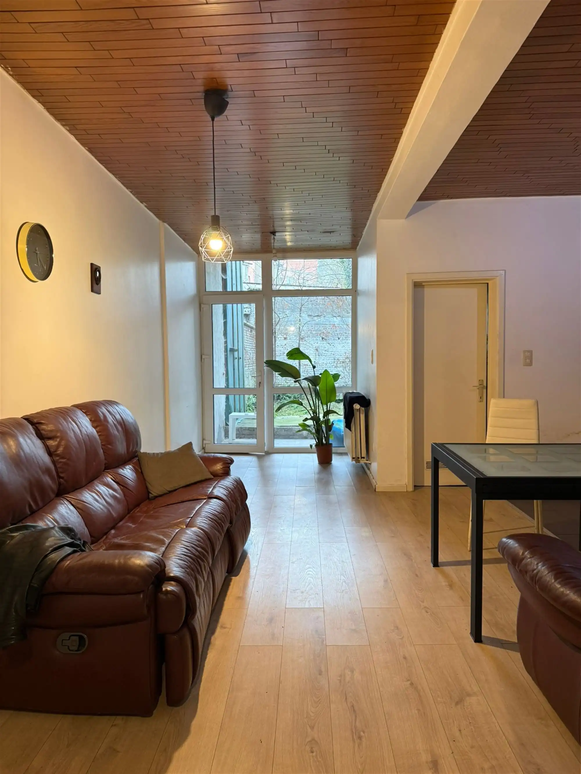 Opbrengsteigendom geacht vergund appartement + triplex foto 2