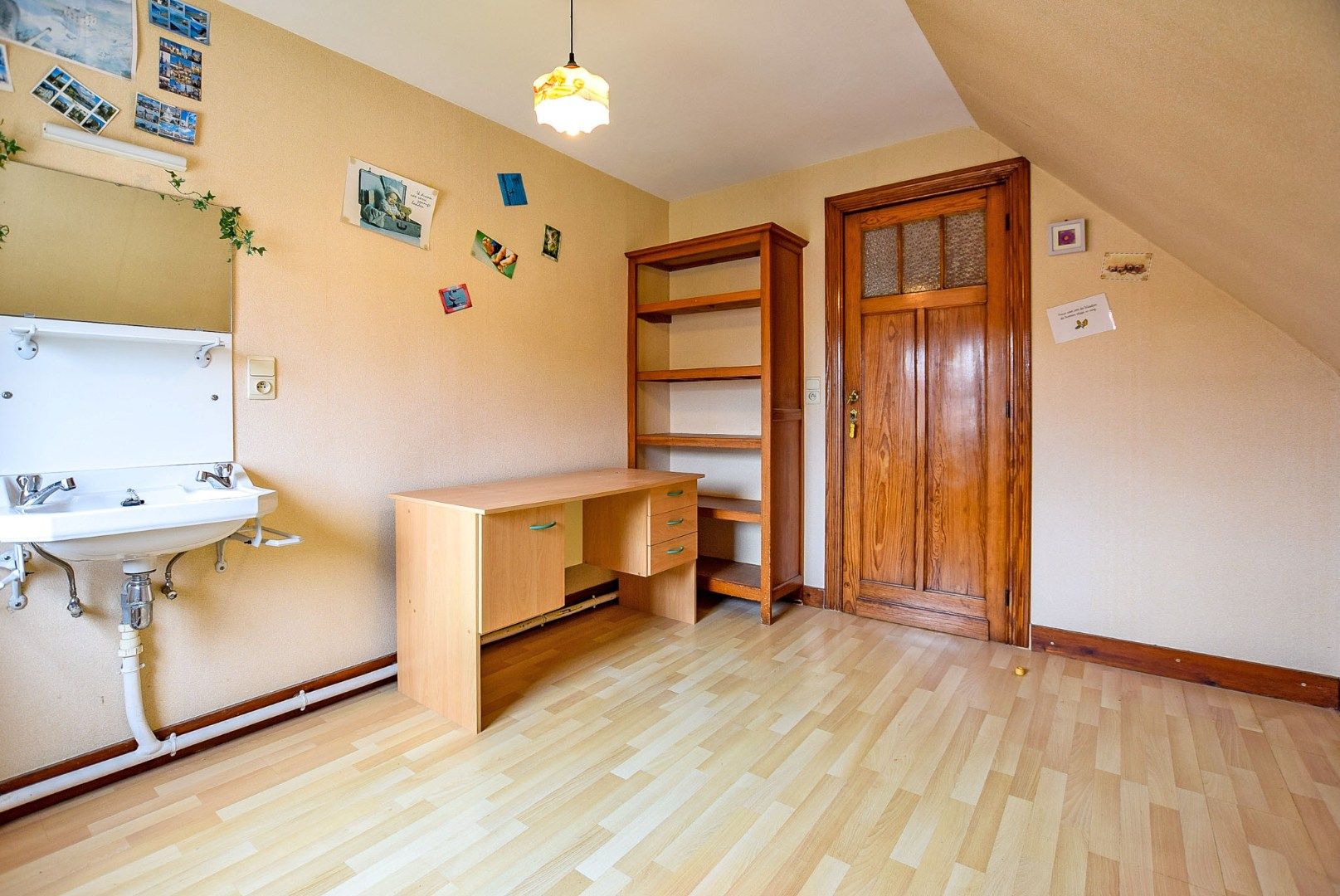 Goed gelegen te renoveren rijwoning bestaande uit een voorgebouw en achterbouw, pal in het centrum van De Panne.  foto 16