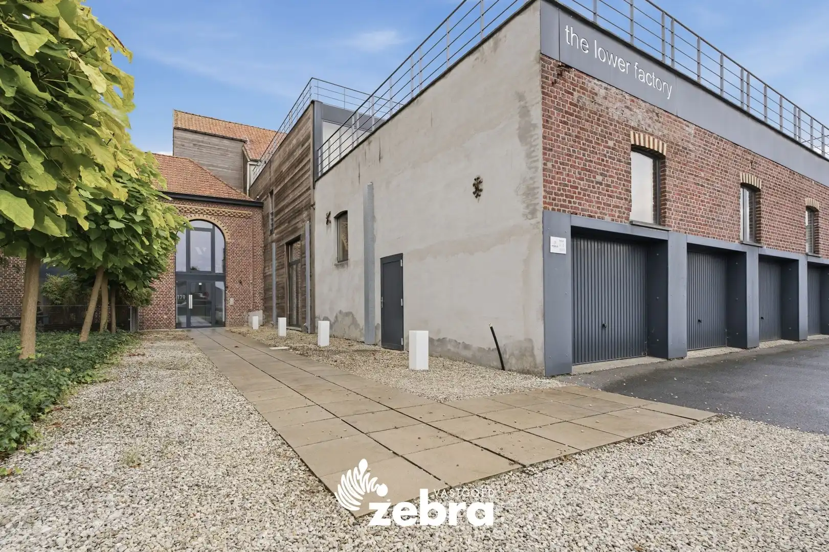 Unieke instapklare loft met twee ruime terrassen, garage en privatieve parkeerplaats in Ardooie! foto 25