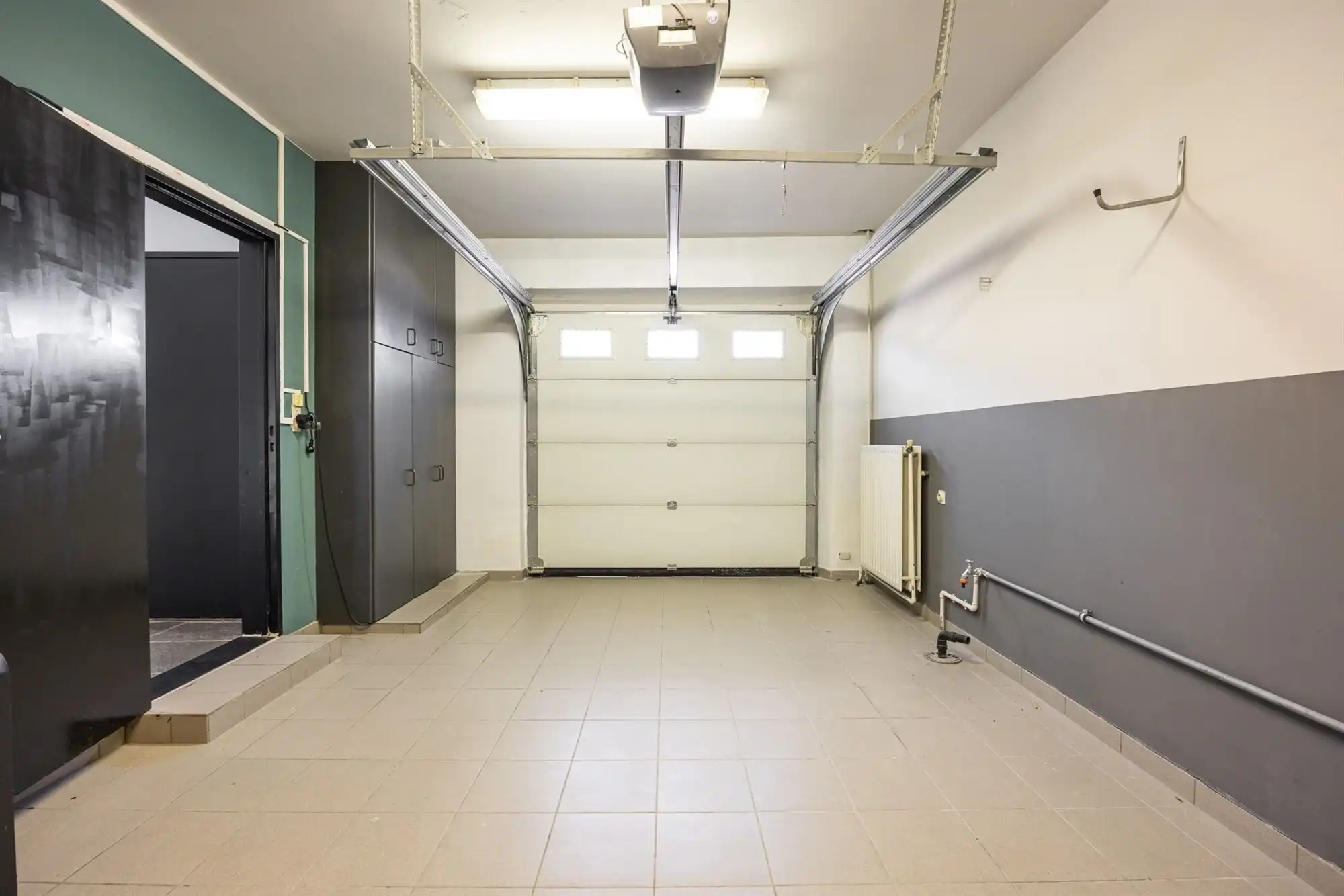 Gezinswoning met garage en zonnige tuin foto 27
