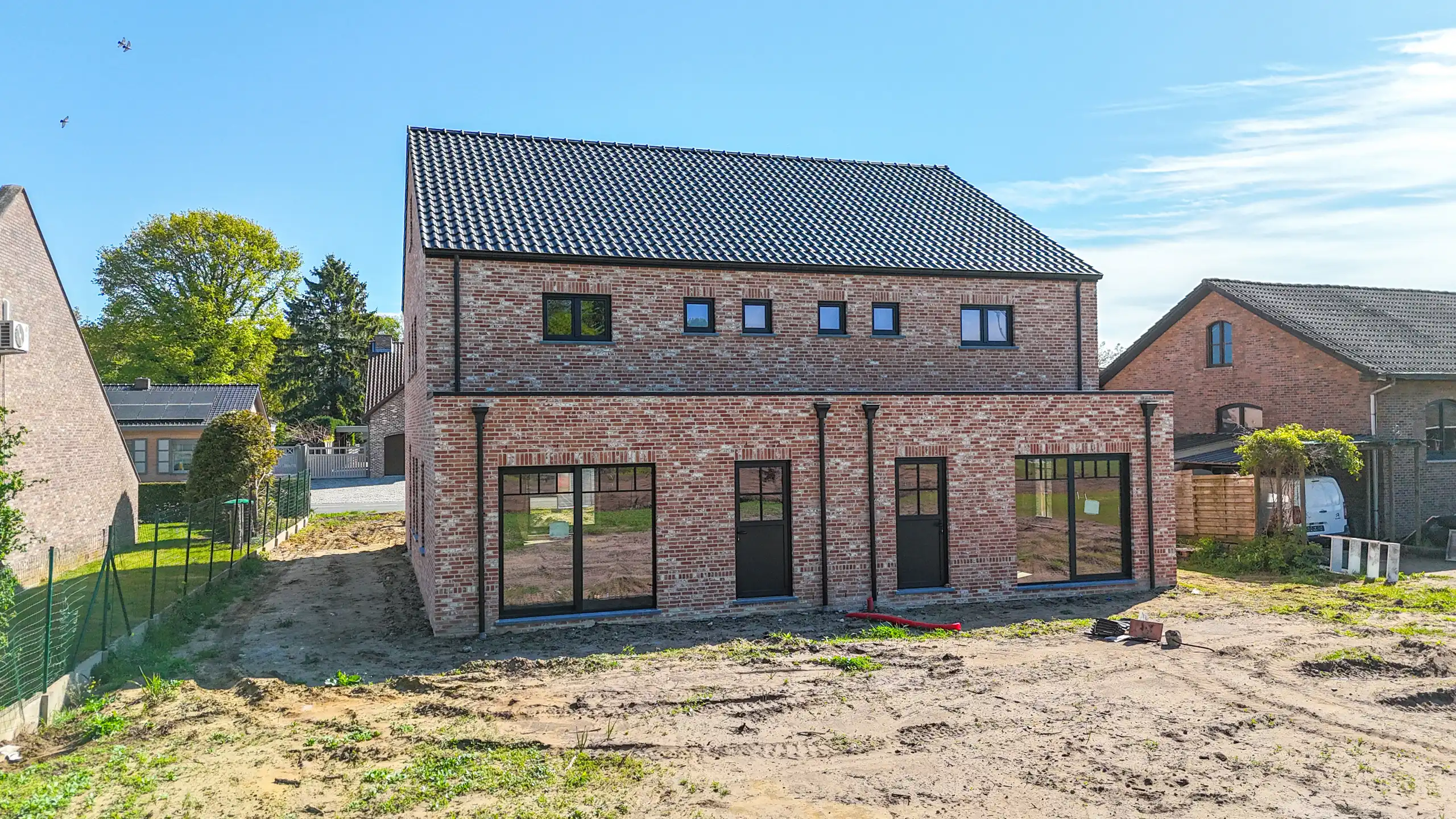 Tijdloze nieuwbouwwoning met 4 slpks + uitzicht op het groen! foto 12