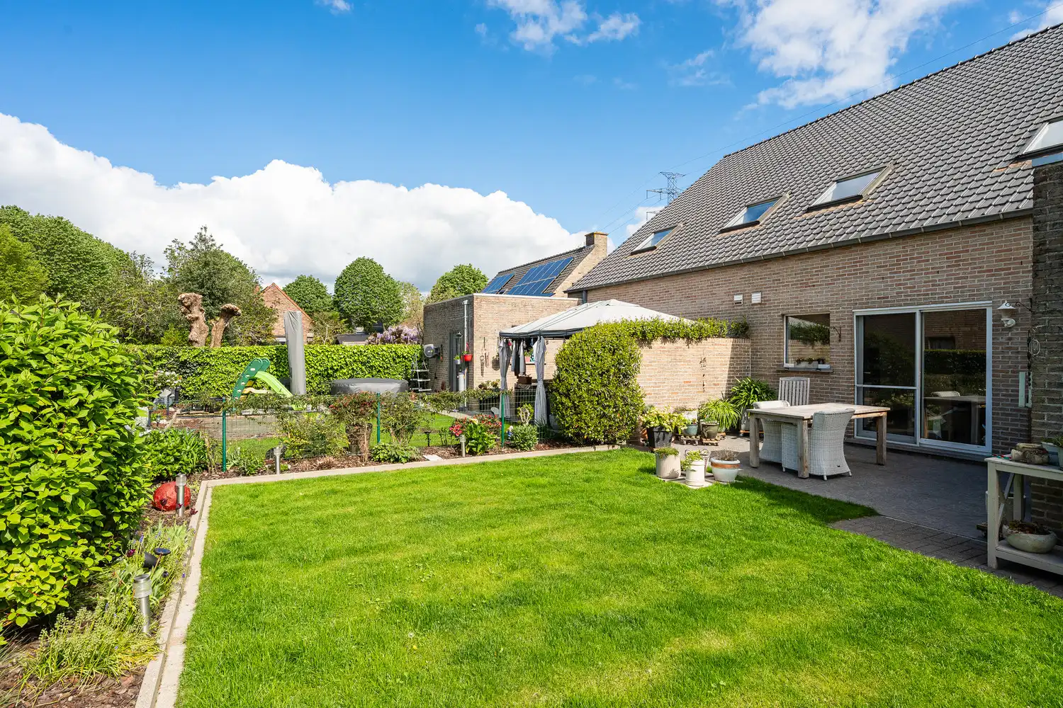 Lichtrijke instpaklare woning te Wondelgem in een residentiële omgeving. foto 13