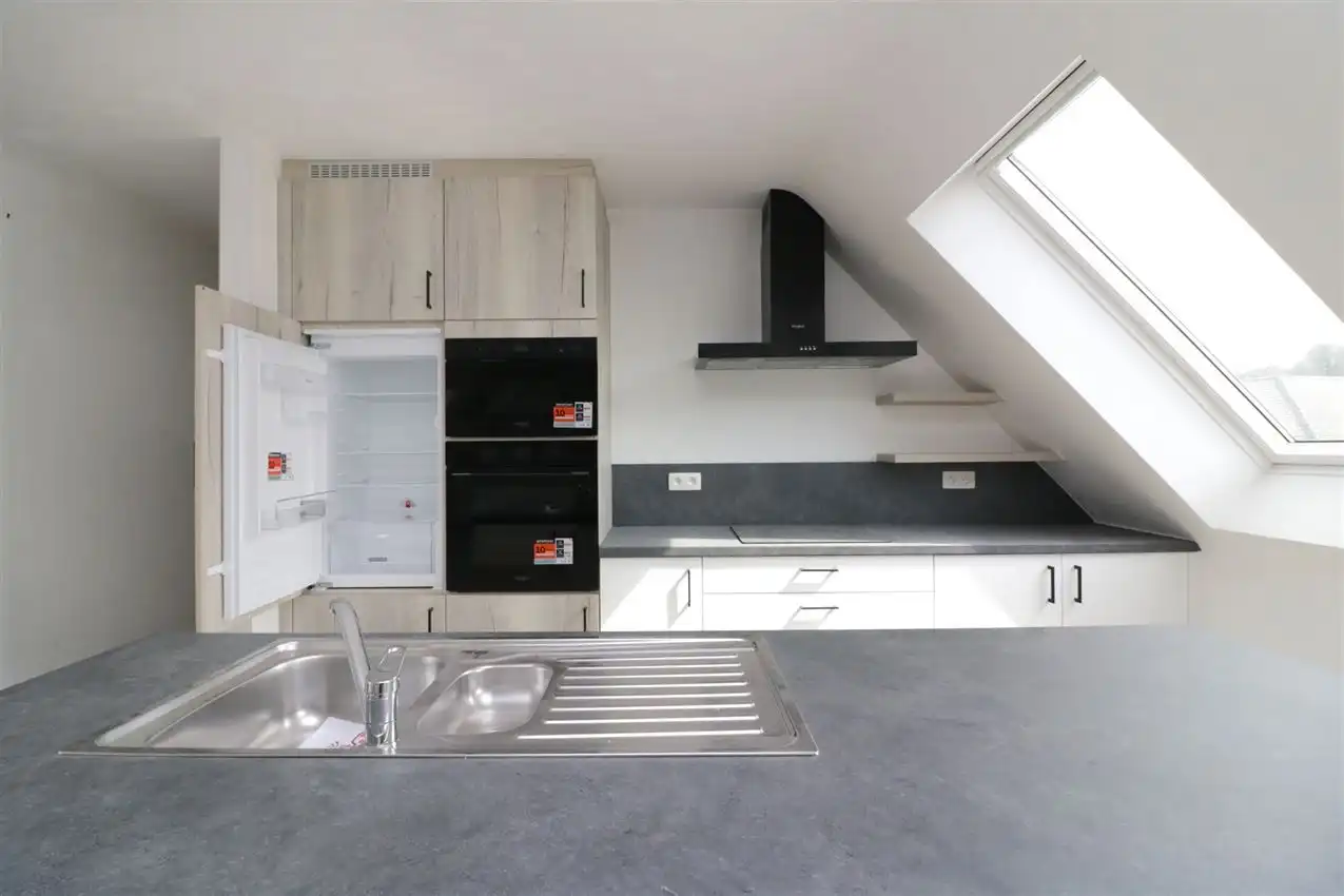 Uniek penthouse in centrum Aarschot met 1 slpk. parking en terras foto 3