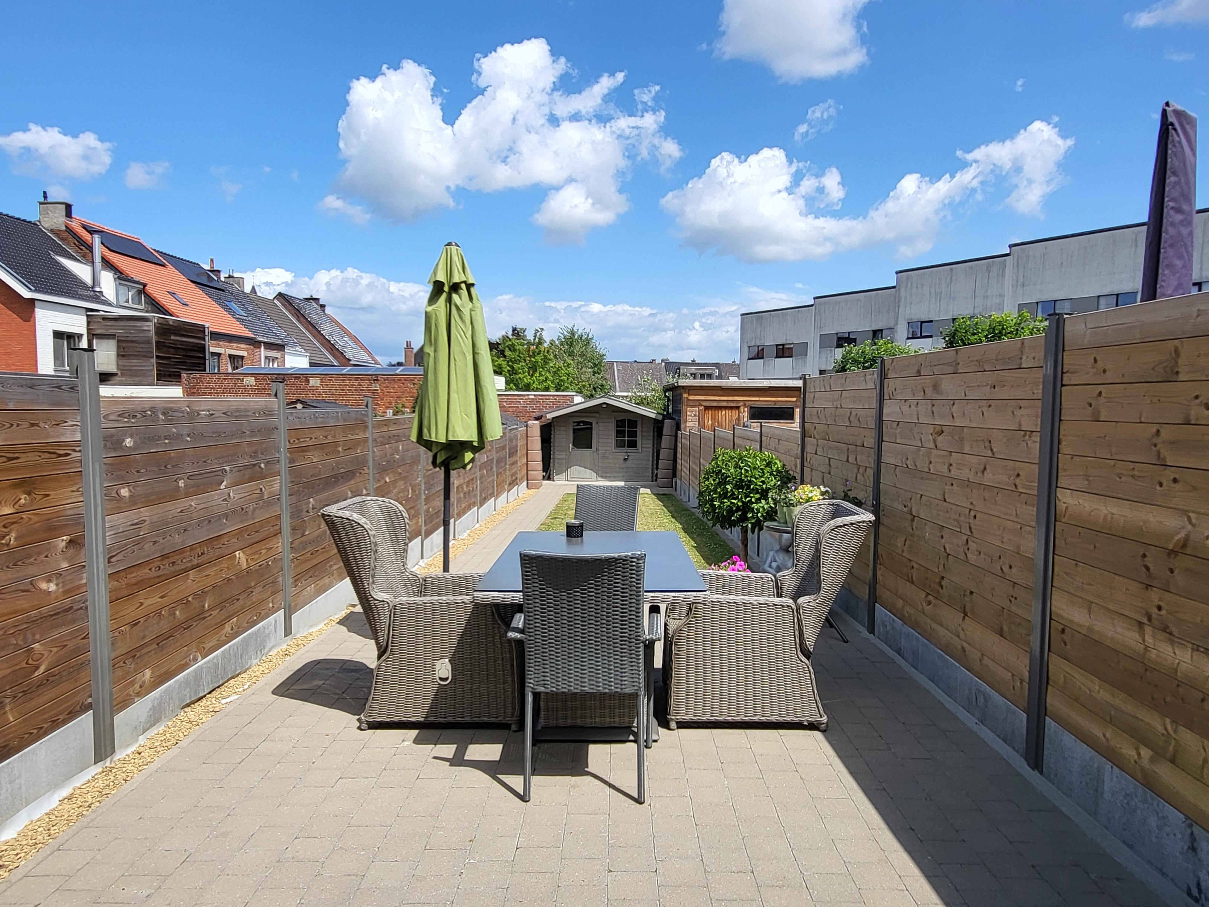 Prachtig onderhouden woning met zonnig tuintje en terras. foto 4