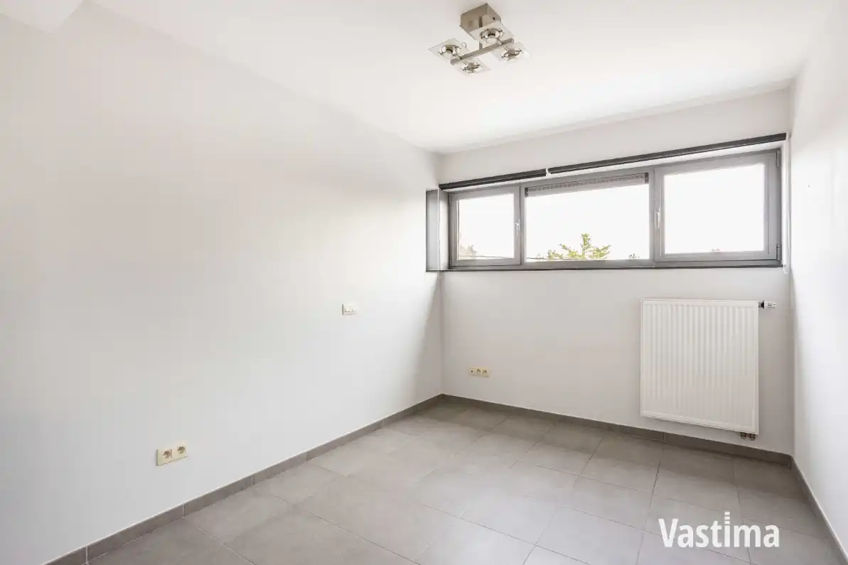 Instapklaar 2-slaapkamerappartement met zuidgericht terras én garage foto 12