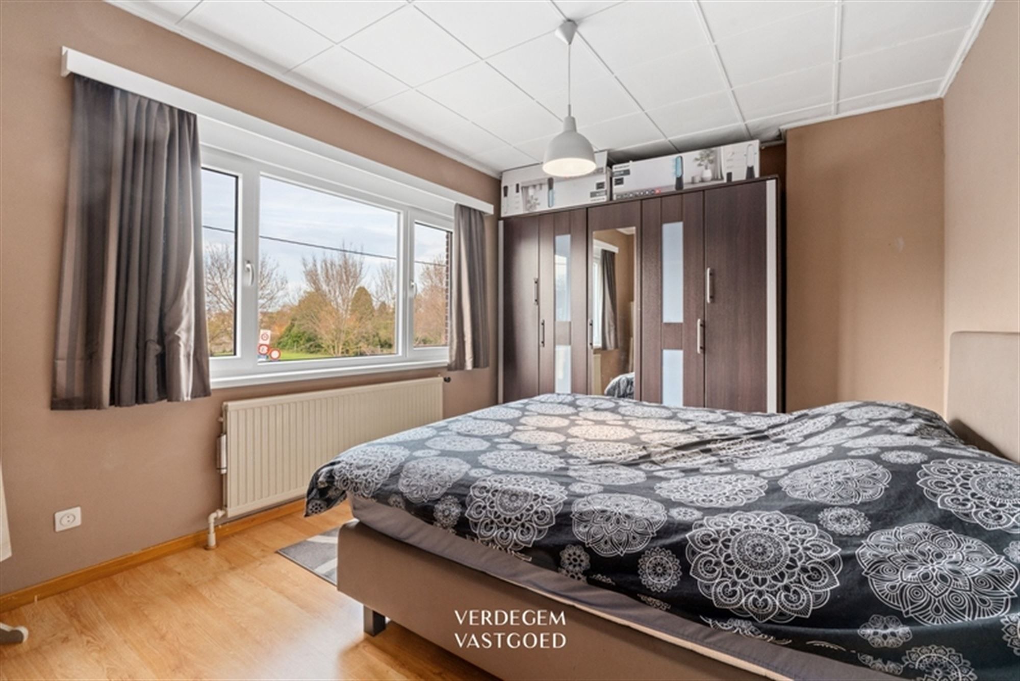 Woning met 4 slaapkamers, tuin en garage op topligging foto 14