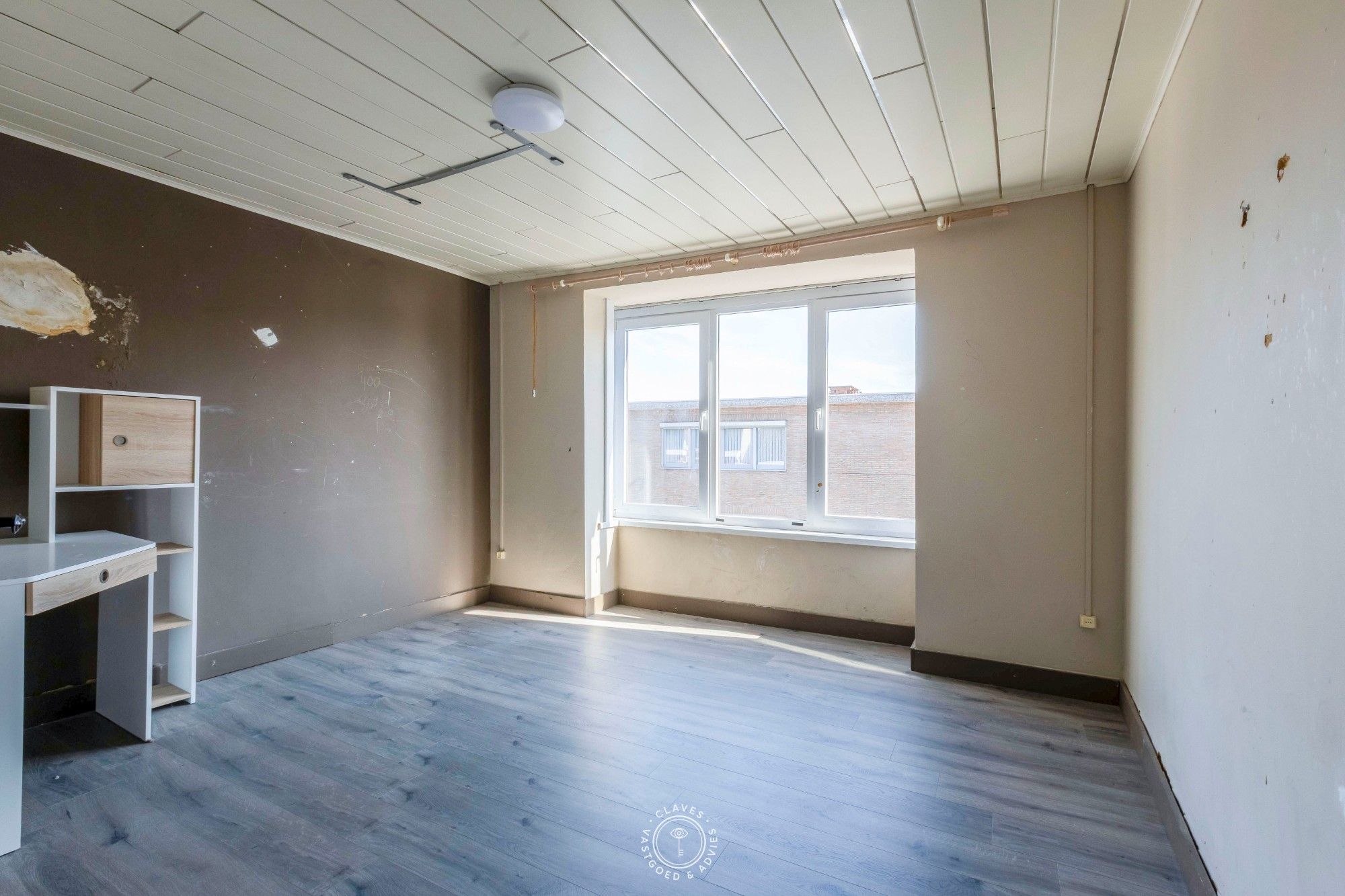Op te frissen woning met vernieuwde structuur, zonnepanelen en zuidgerichte tuin foto 18