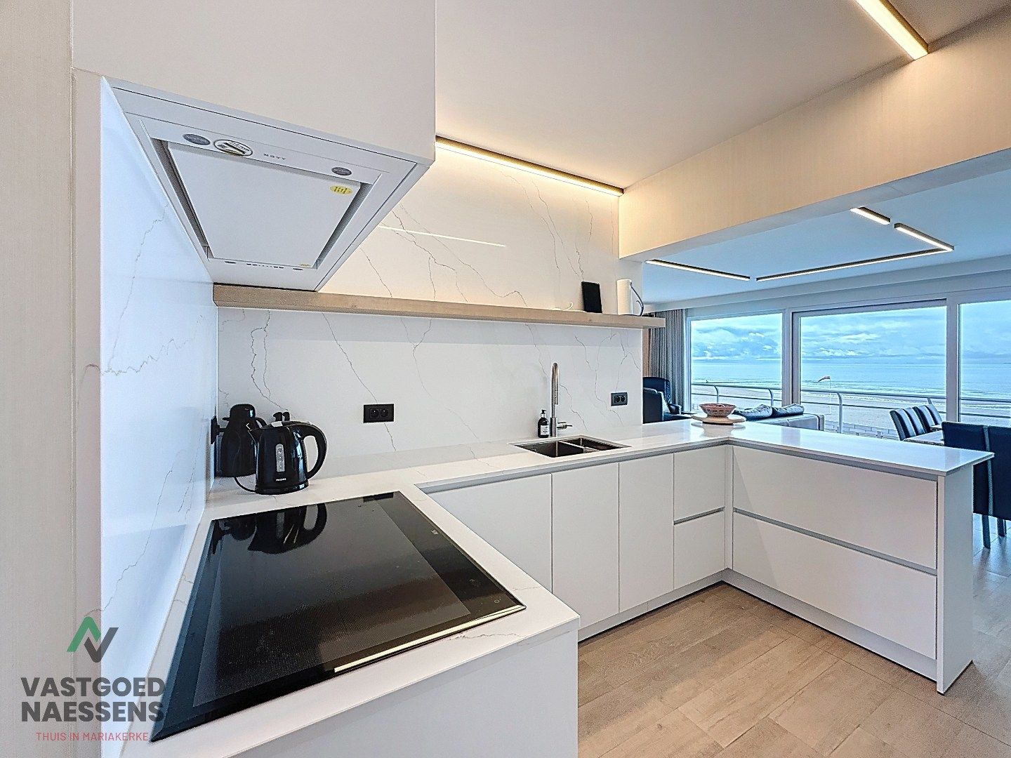 SCHITTEREND VERNIEUWD 3 SLPK APP MET ZICHT OP ZEE EN TERRAS foto 10