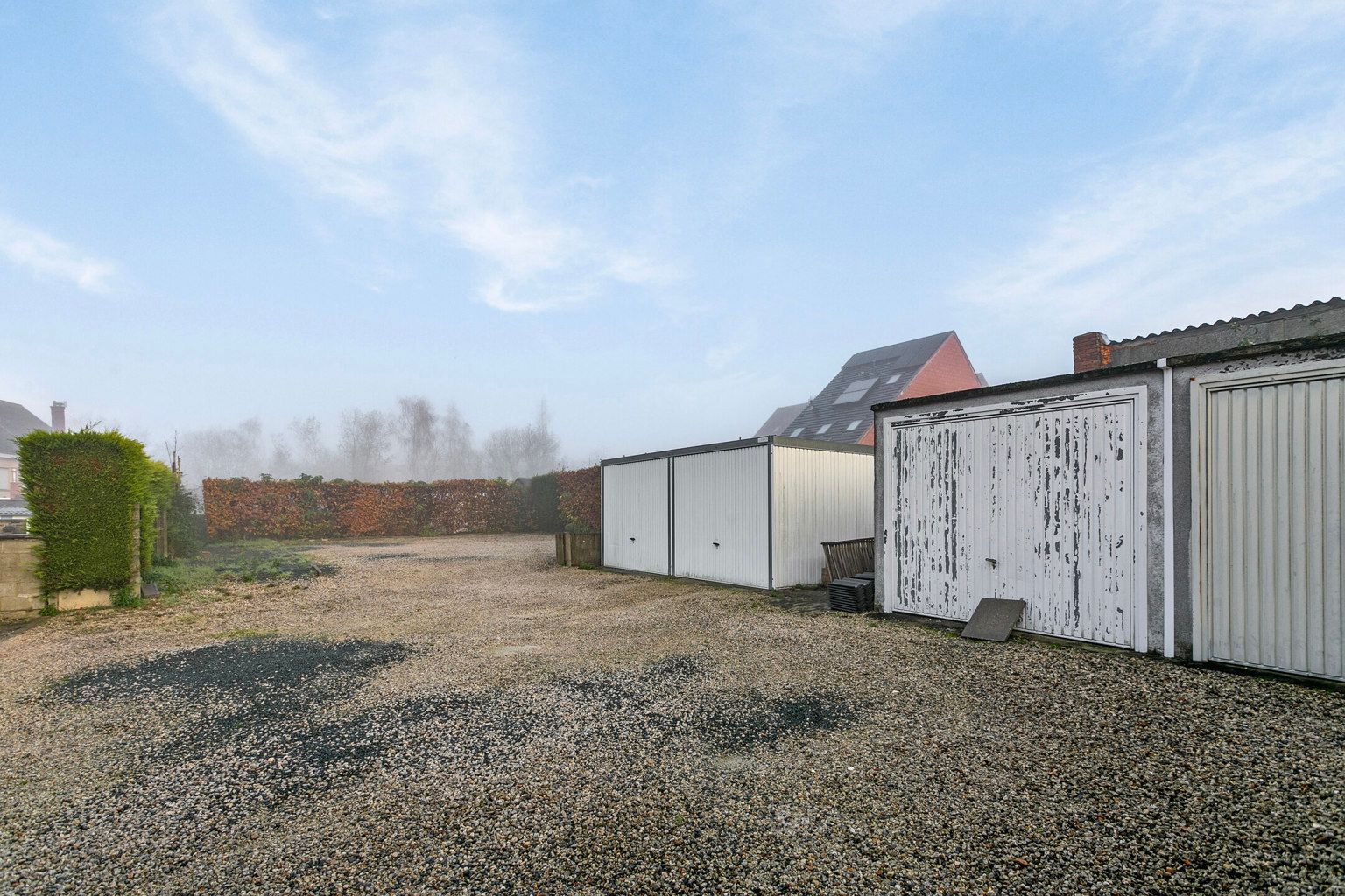 immo DAVID stelt voor: 5 garages en 4 staanplaatsen te Asse foto 1