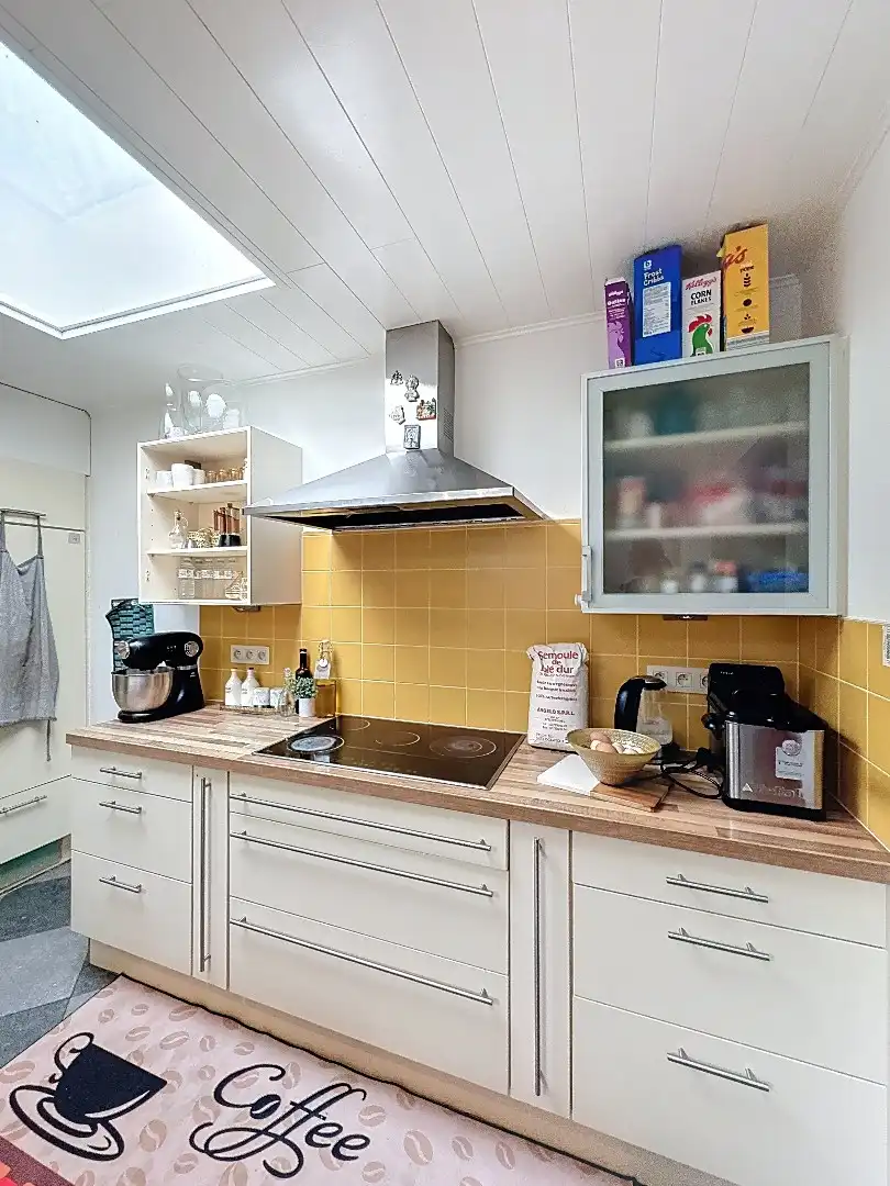 Volledig gerenoveerde,  centraal gelegen rijwoning in Tienen met tuin, terras en 3 slaapkamers foto 6