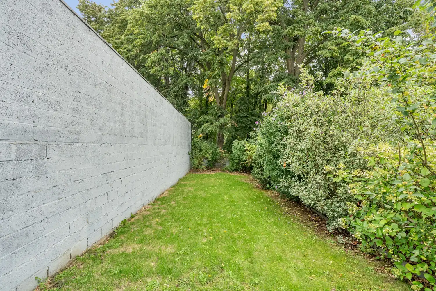 Gerenoveerde en energiezuinige woning met 4 slaapkamers en een tuin grenzend aan het Mariapark te Leuven! foto 9