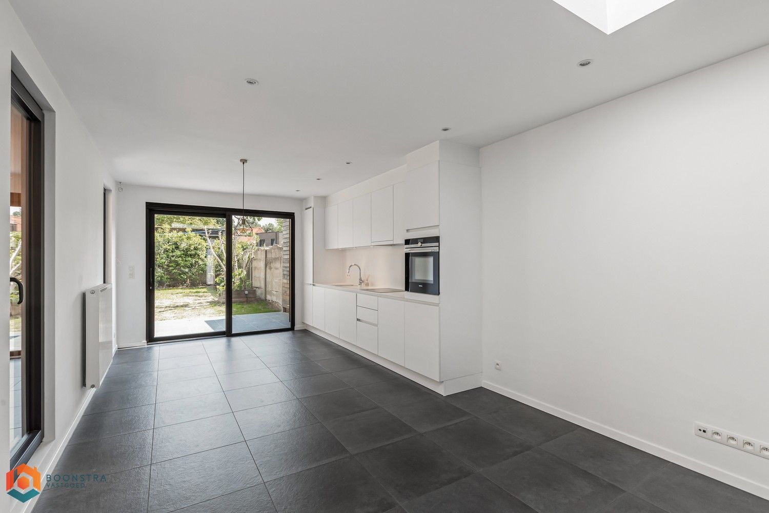 Gerenoveerde woning met 2 slpkrs en tuin te Bonheiden foto 5