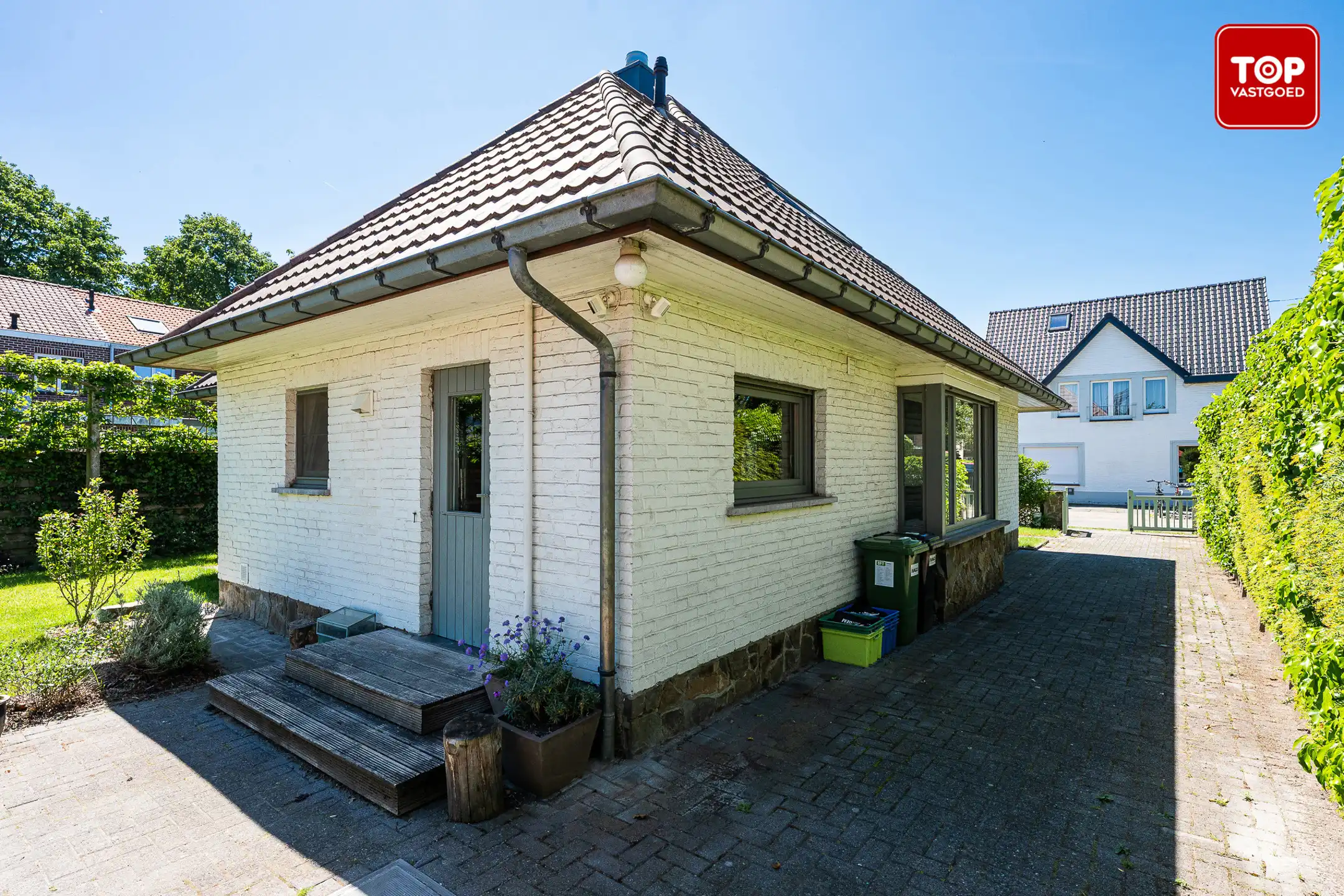Instapkler open bebouwing in rustige straat met veel groen rondom. foto 28