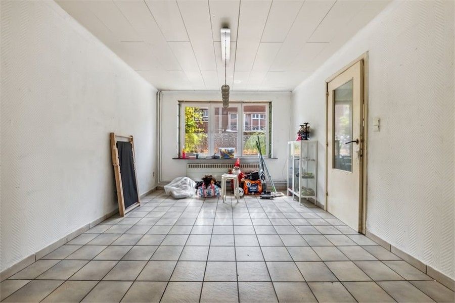 KNUSSE GEZINSWONING MET GEZELLIGE STADSTUIN IN HASSELT foto 7