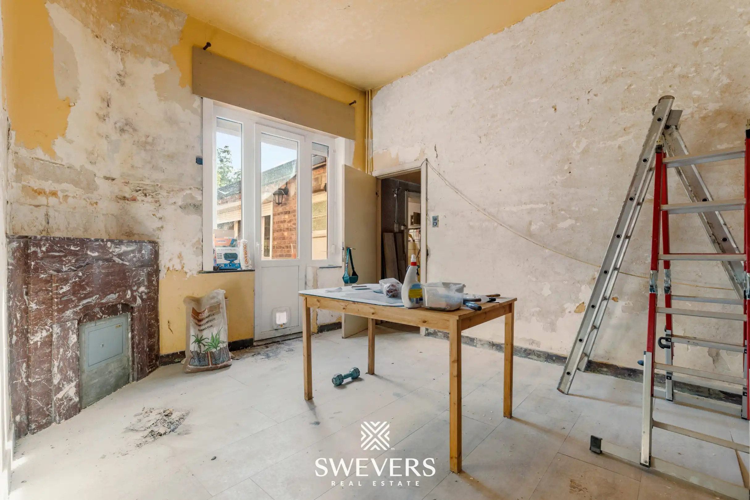 Uitstekend gelegen te renoveren woning met 3 slaapkamers foto 14
