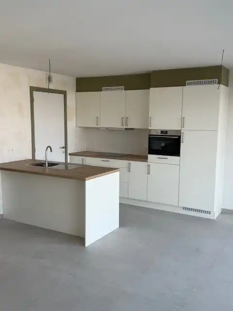 Energiezuinig nieuwbouwappartement met 2 slaapkamers, terras en parking in centrum Houthalen foto 3