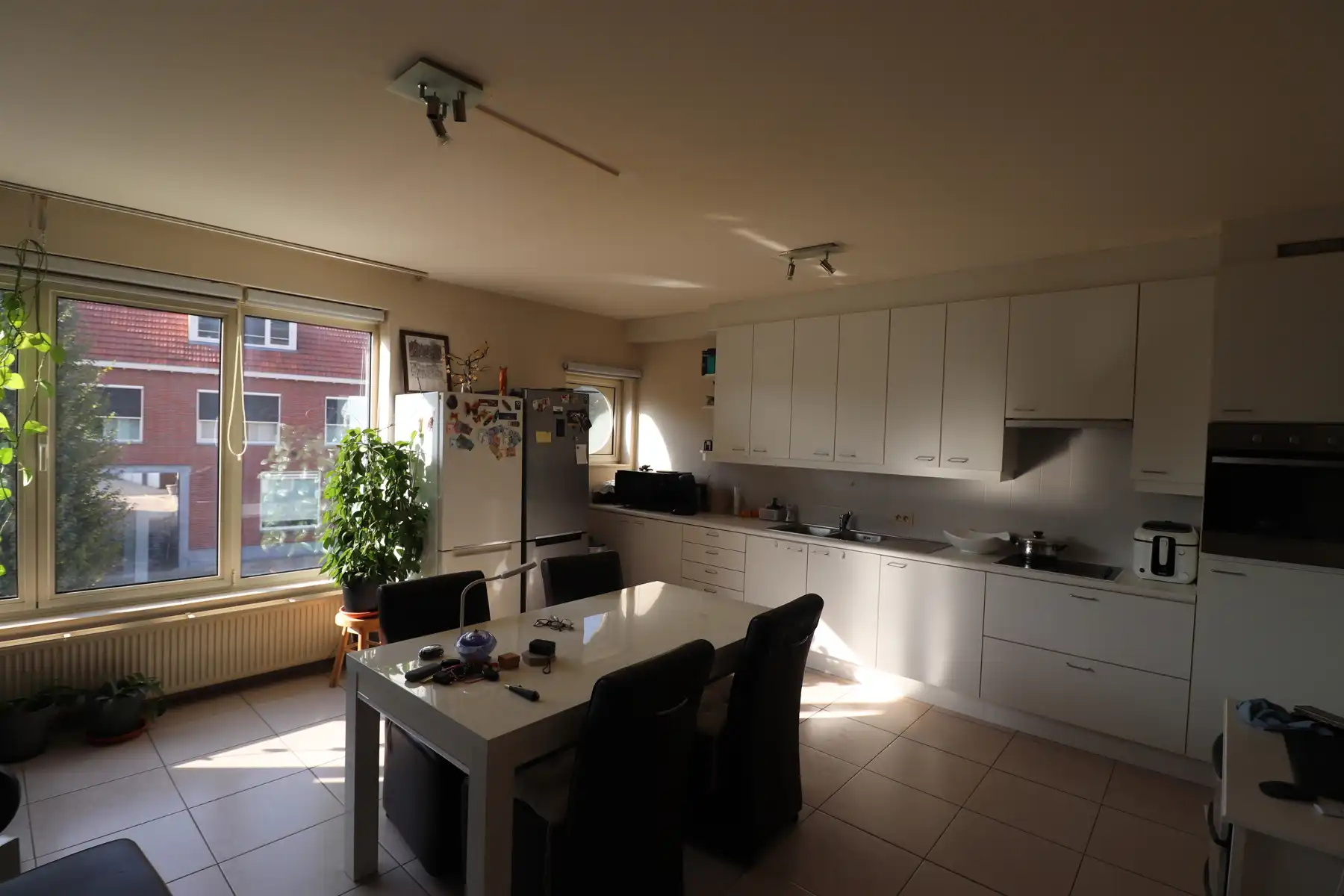 Ruim 2-slaapkamerappartement met lift, groot terras en ondergrondse autostaanplaats in het centrum van Baarle-Hertog foto 2