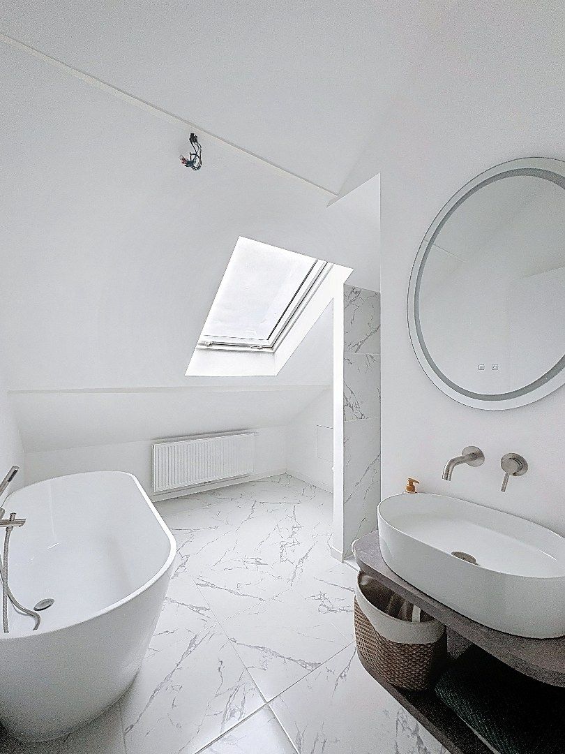 Elegant wonen in Tienen: gerenoveerde rijwoning met 3 slaapkamers en zuidwestgerichte tuin. foto 17